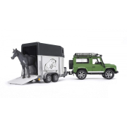 Hračka Bruder - Land Rover Defender s prepravníkom na koňa a koníkom